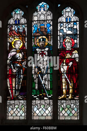 Memorial stained glass by Christopher Whall, St. Leonard`s Church, Apethorpe, Northamptonshire, England, UK Stock Photo